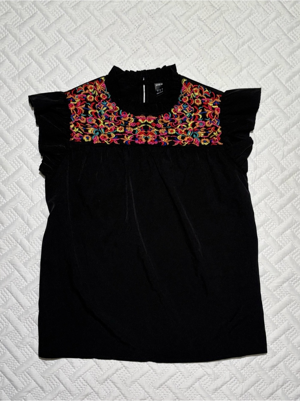 black flutter-sleeve top vibrant, multicolored floral embroidery size small